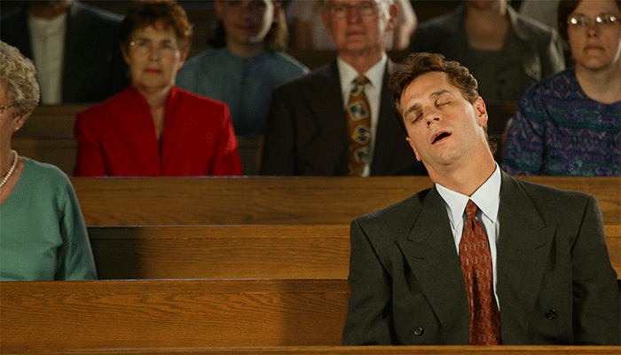 Man Sleeping in Church